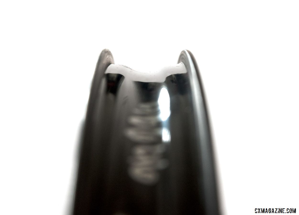 The tubeless rim has a hookless design. Industry Nine Ultralite 240 TRA Carbon Tubeless Clincher Wheelset. © C. Lee / Cyclocross Magazine