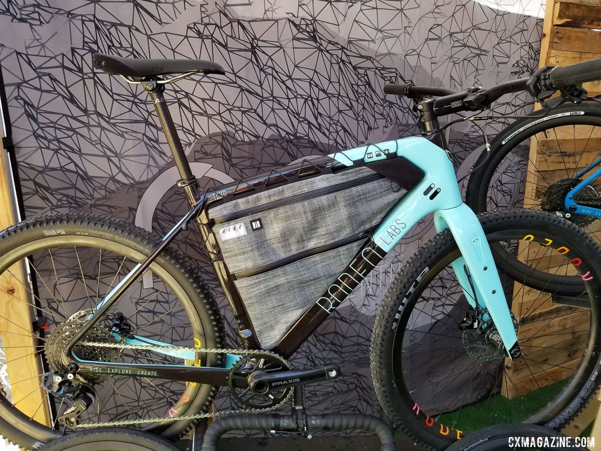 Rodeo Labs had a Trail Donkey 3.0 that was set up to quickly swap between 650b wheels and flat bars to 700c wheels and drop bars. 2019 Sea Otter Classic. © Cyclocross Magazine