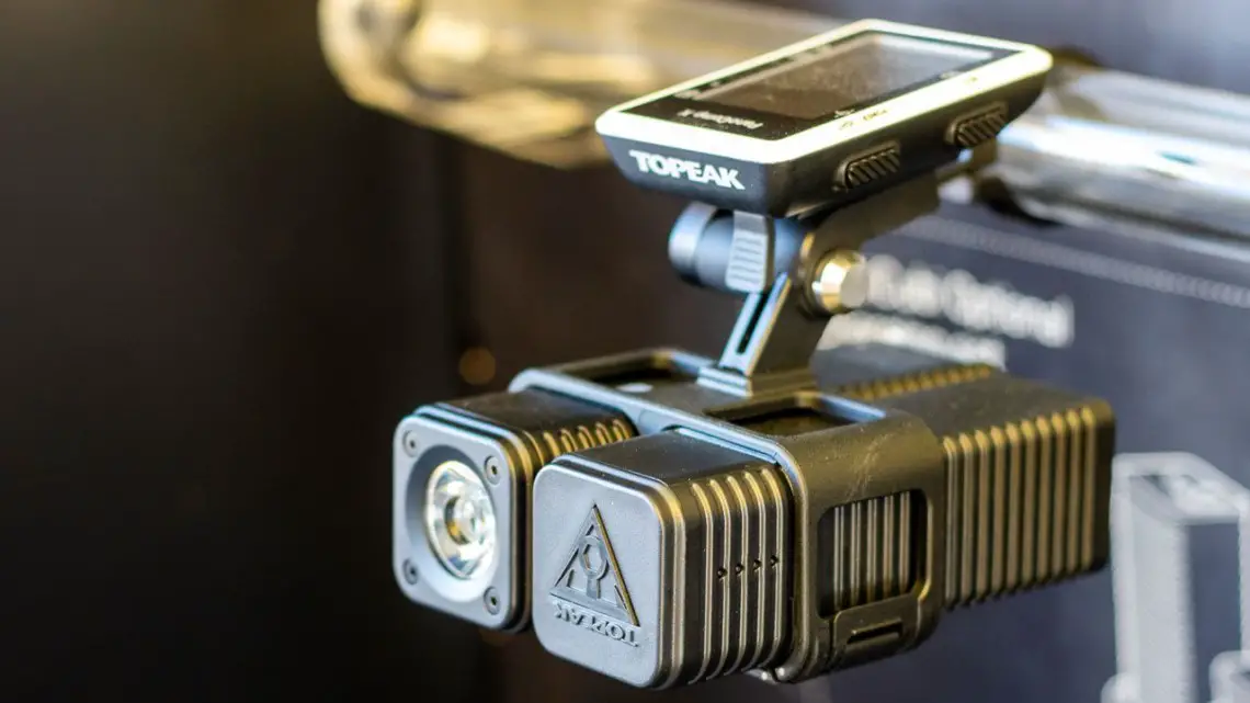Topeak's CubiCubi series helps you mount a Topeak light (up to 1200 lumens), a spare battery, a GoPro, and your head unit in a tidy package. Lights start at $99, while a 6000 mAh battery pack retails for $49.95. © A. Yee / Cyclocross Magazine