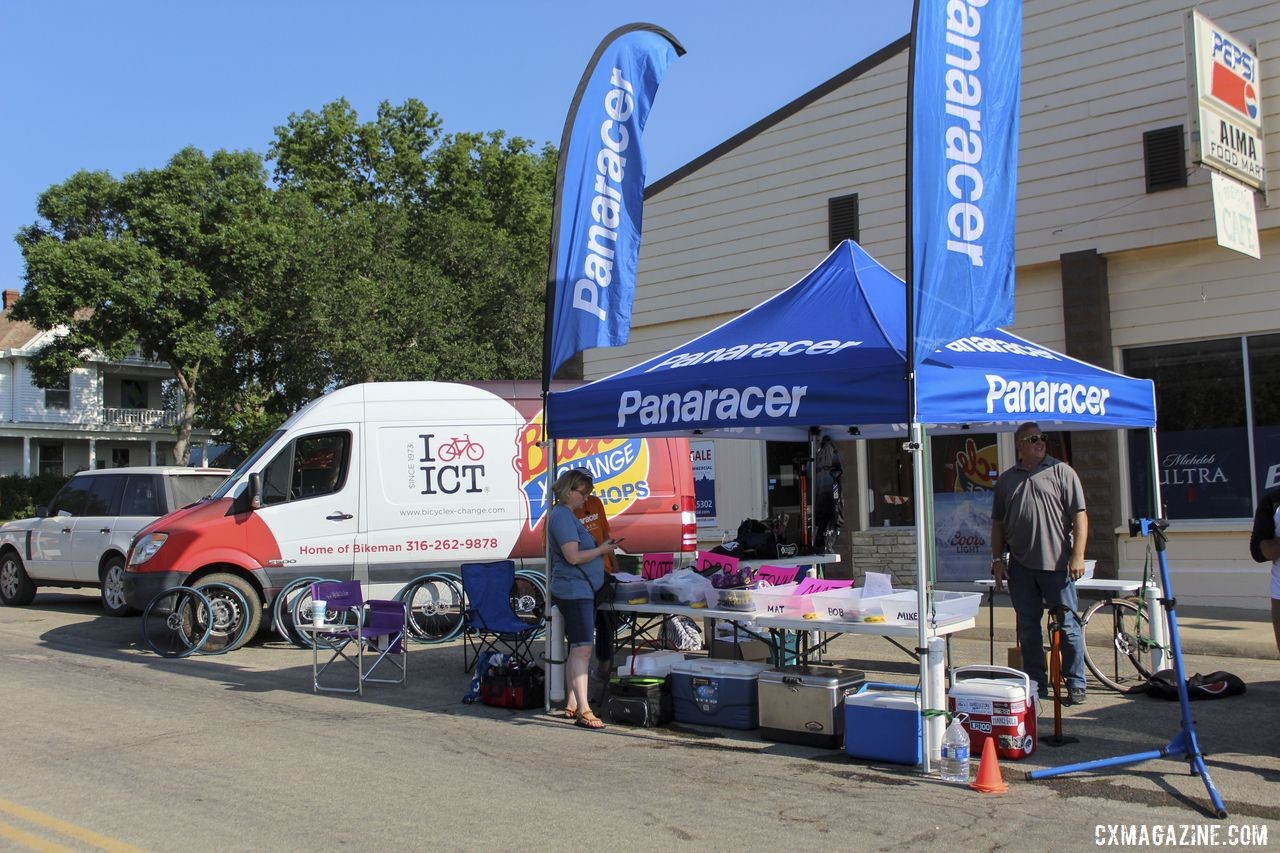 Pop-up tent, van, flags, it was all ready to go early Saturday morning. 2019 Dirty Kanza 200, Panaracer / Factor p/b Bicycle X-Change Checkpoint 1. © Z. Schuster / Cyclocross Magazine