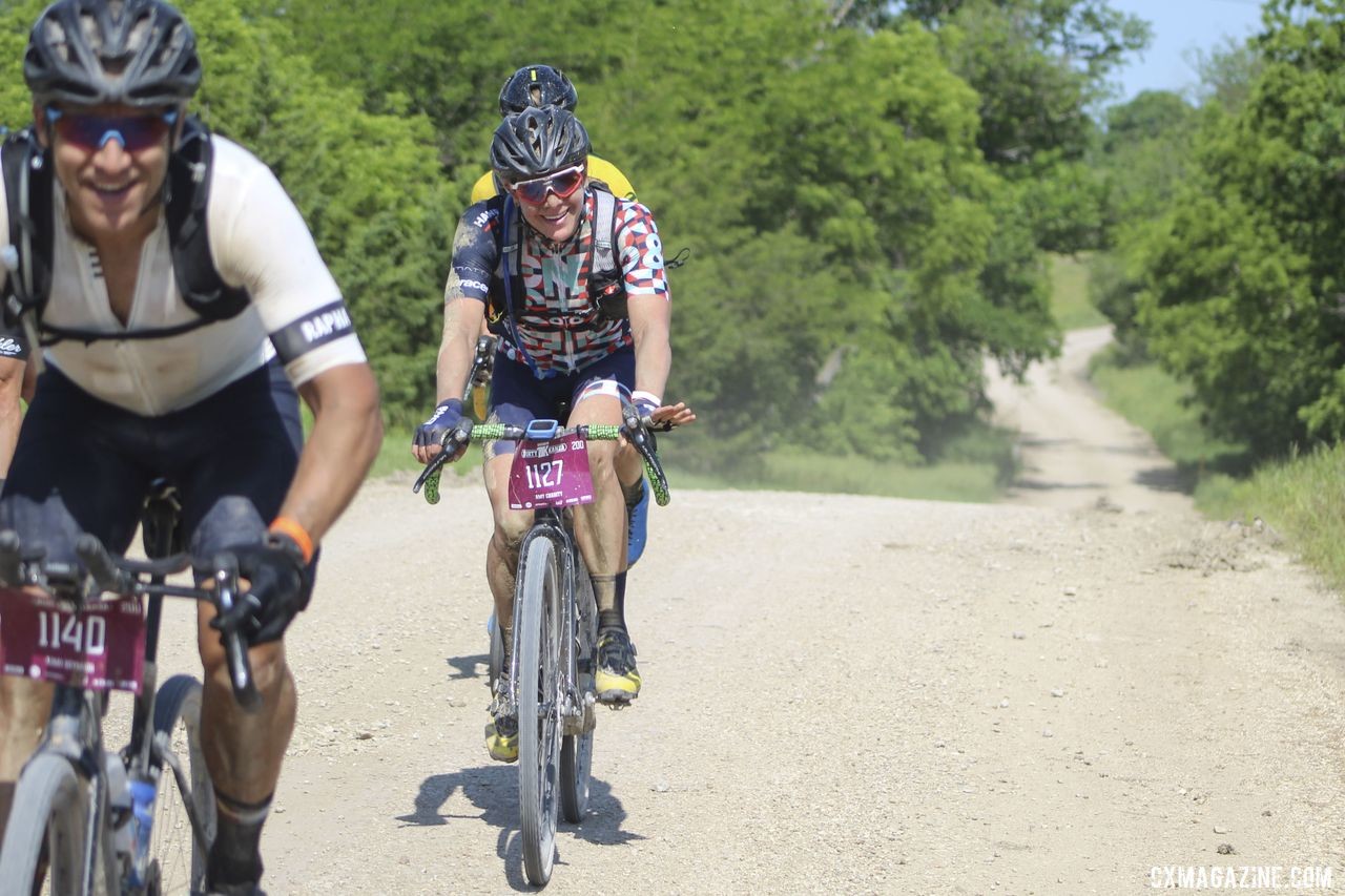 Amy Charity finds some strength to mug for the camera. 2019 Dirty Kanza 200 Gravel Race. © Z. Schuster / Cyclocross Magazine