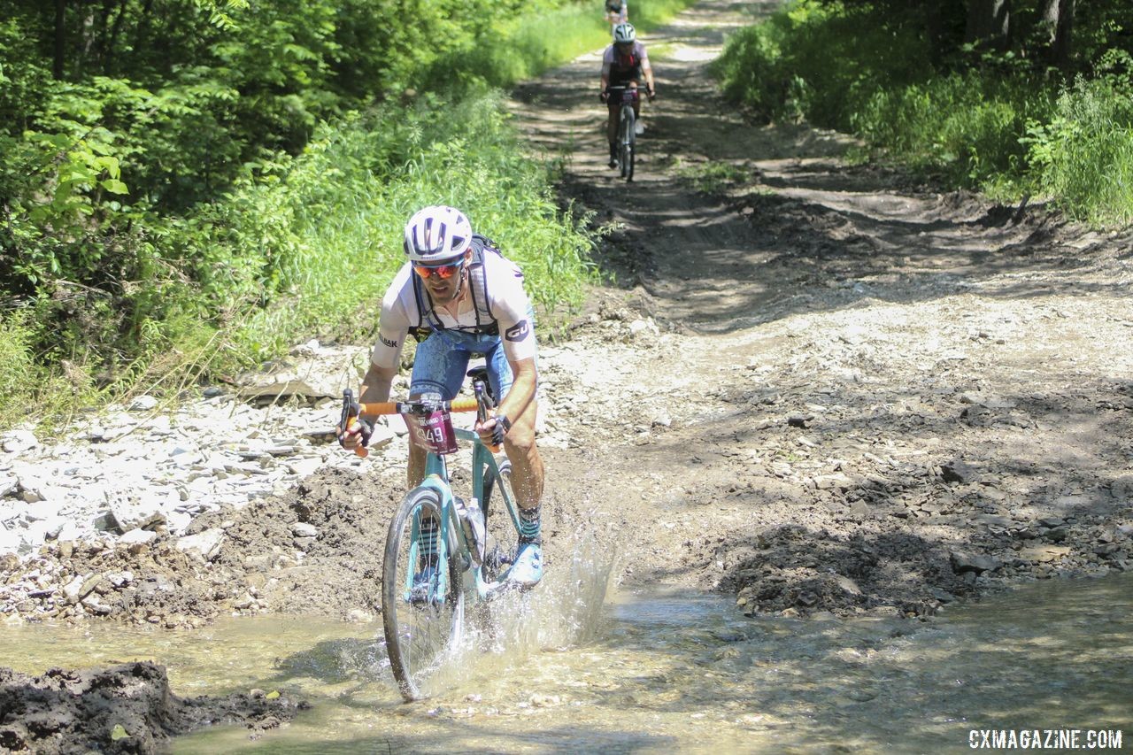 Geoff Kabush sends it through a creek crossing. 2019 Dirty Kanza 200 Gravel Race. © Z. Schuster / Cyclocross Magazine
