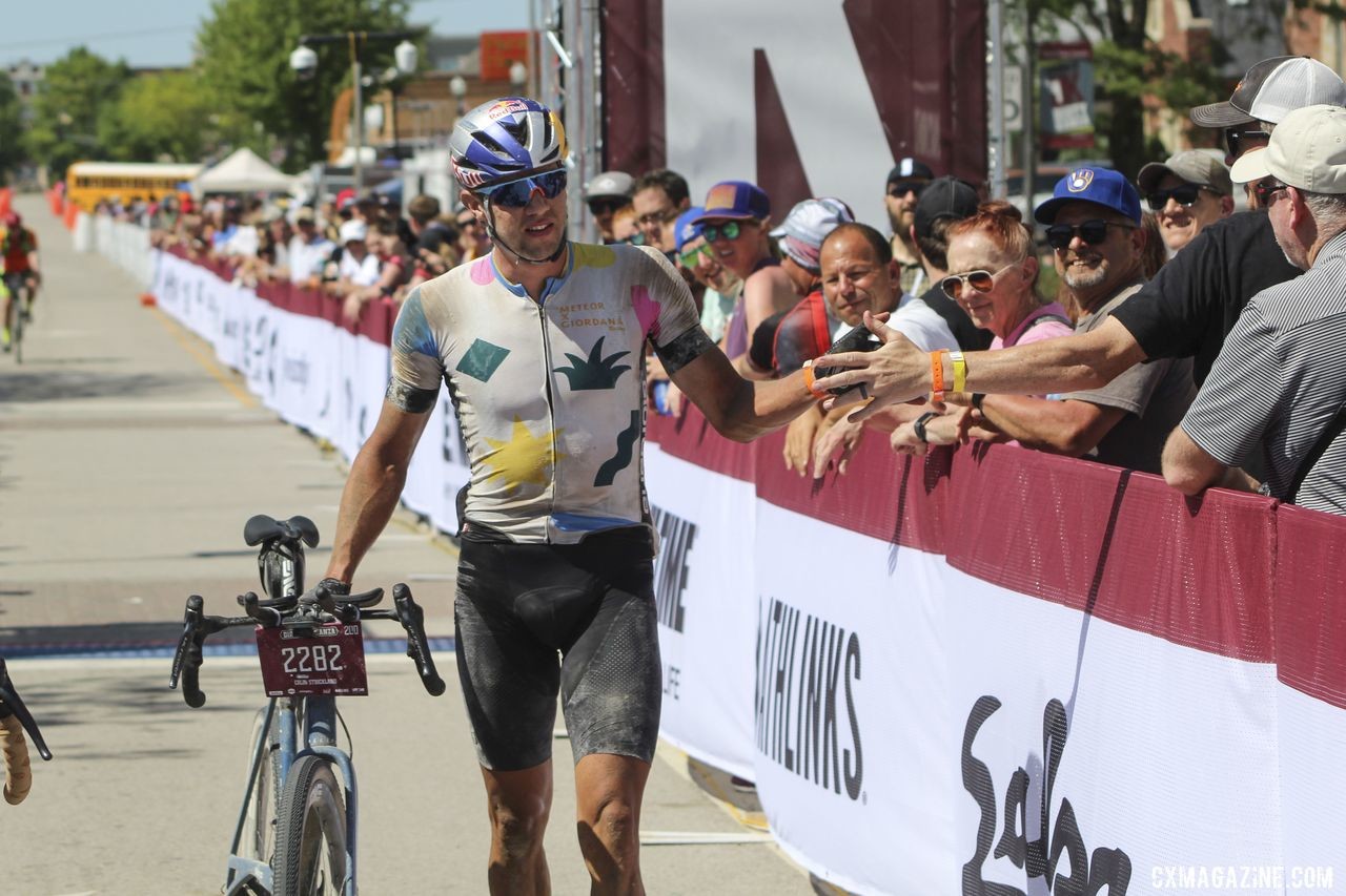 Colin Strickland ackowledges some fans after his DK200 win. 2019 Dirty Kanza 200 Gravel Race. © Z. Schuster / Cyclocross Magazine