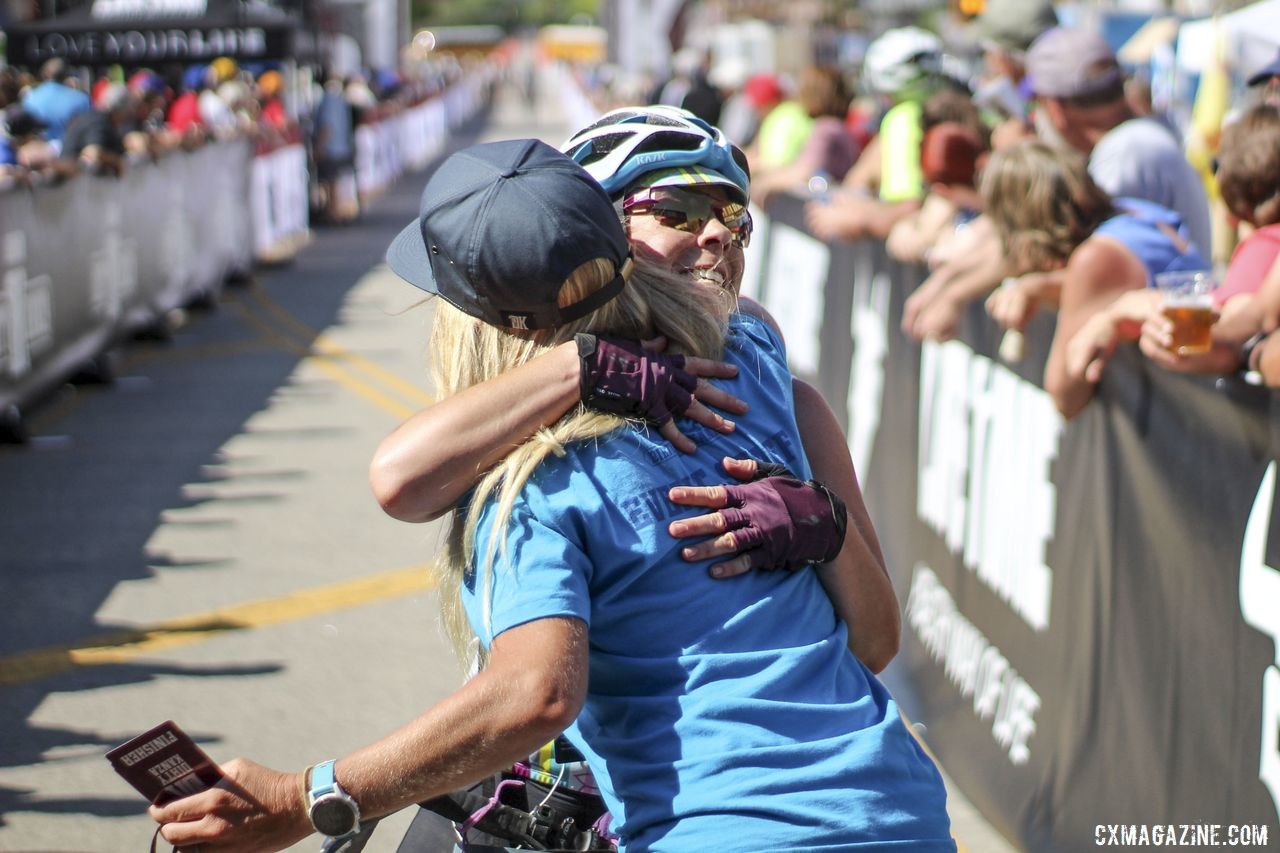 Hugs were in abundance at the finish. 2019 Dirty Kanza 200 Gravel Race. © Z. Schuster / Cyclocross Magazine