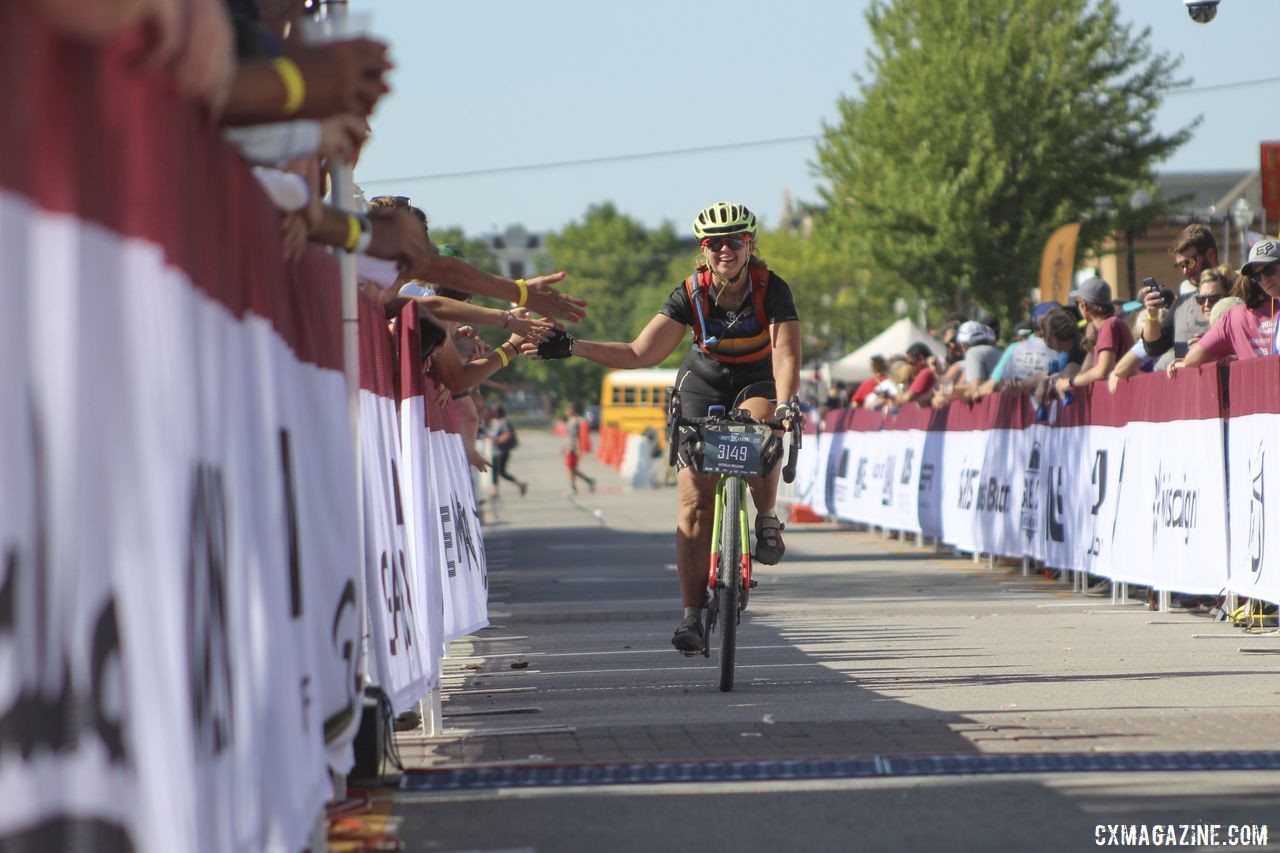 Finish line high fives aren't just for podium finishers at the Dirty Kanza. 2019 Dirty Kanza 200 Gravel Race. © Z. Schuster / Cyclocross Magazine