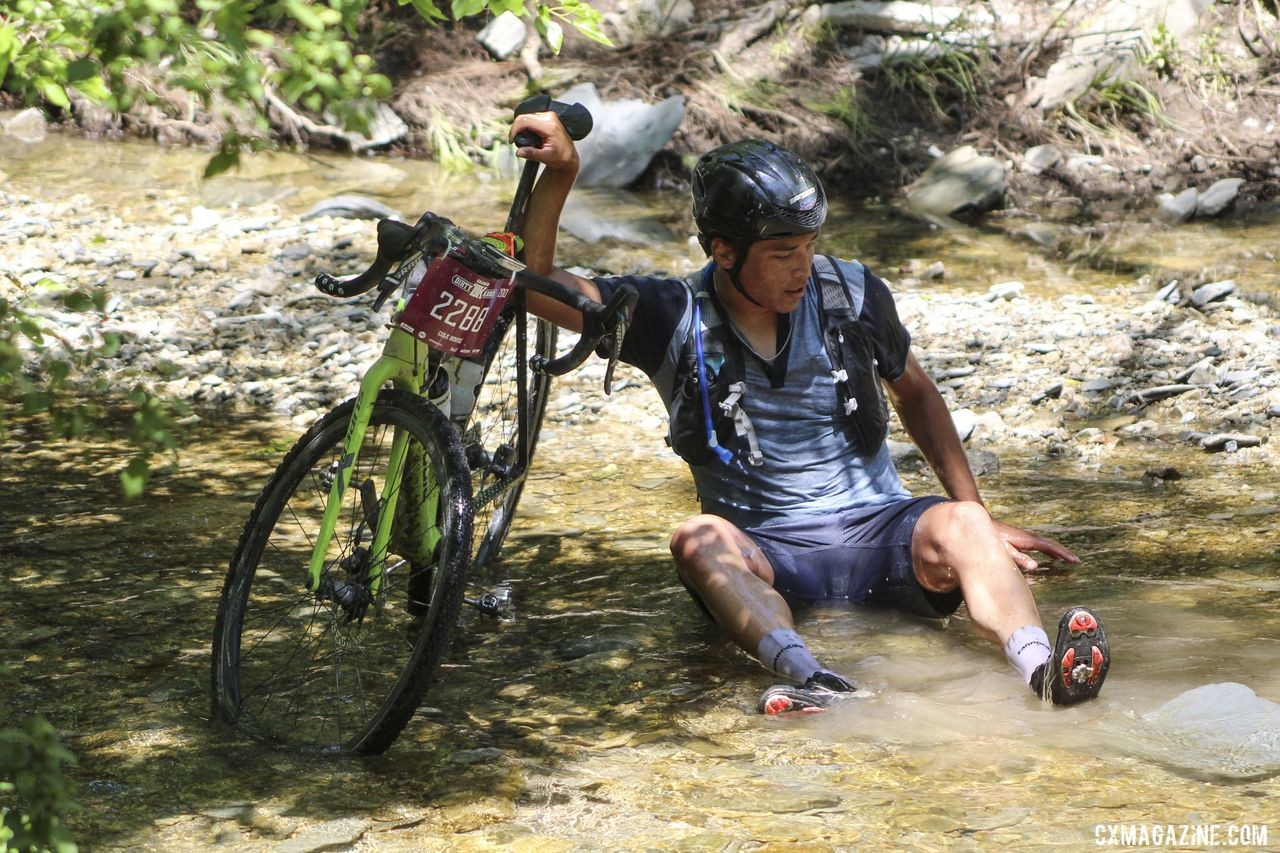 Cole House stops to cool down. 2019 Dirty Kanza 200 Gravel Race. © Z. Schuster / Cyclocross Magazine