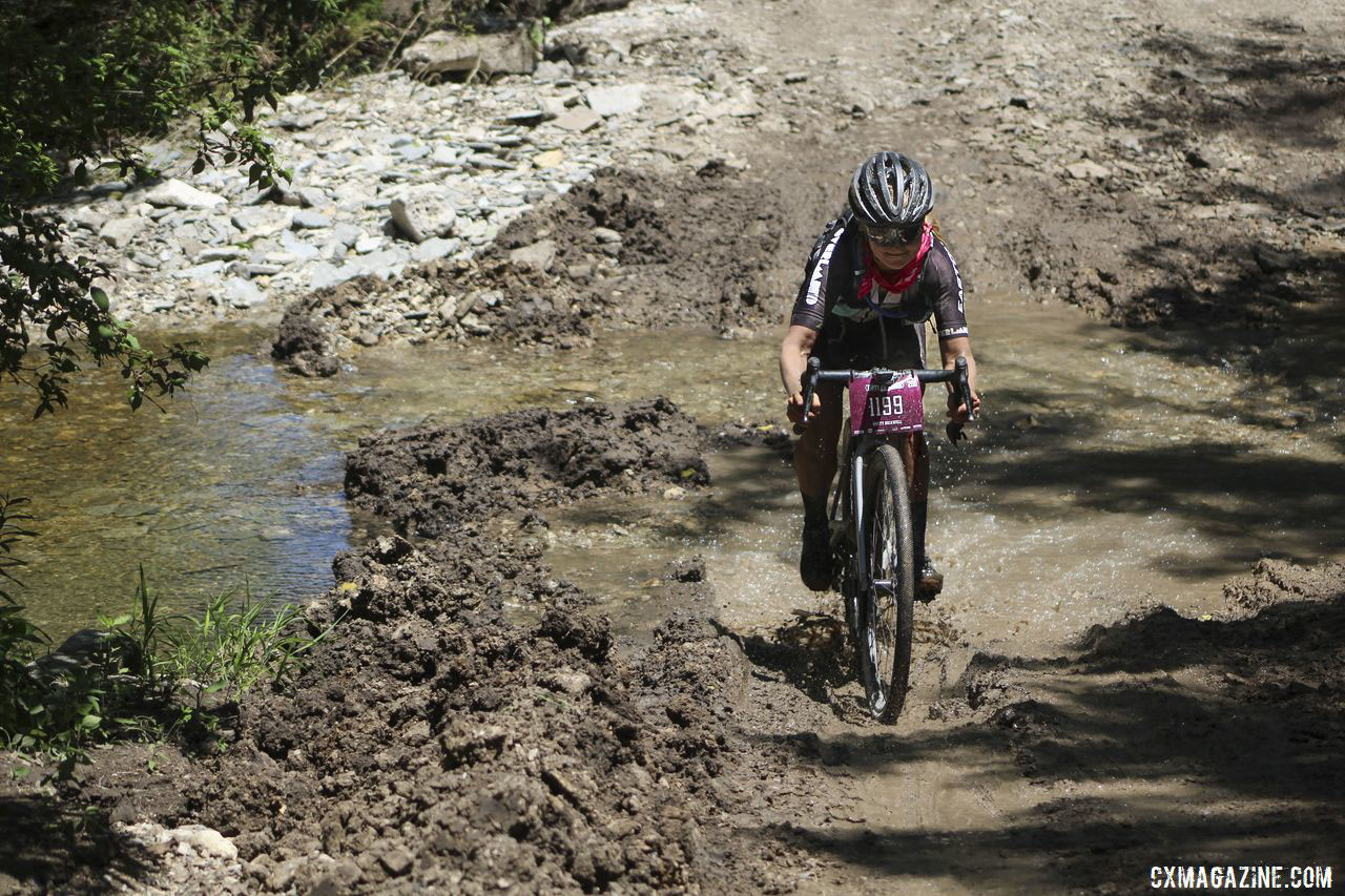 Amity Rockwell splashes through the Little Ford crossing. 2019 Dirty Kanza 200 Gravel Race. © Z. Schuster / Cyclocross Magazine
