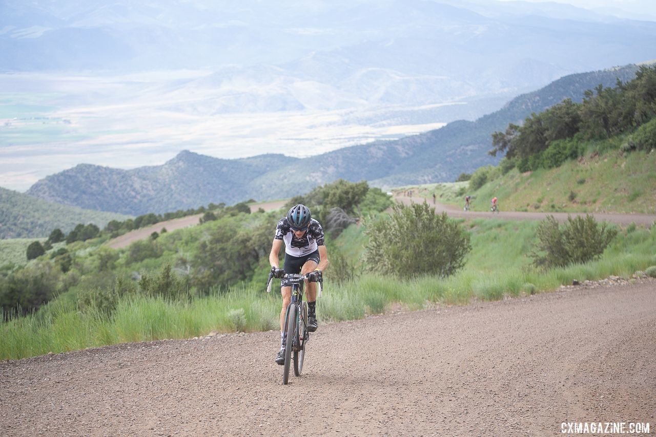 Alex Grant pushes up the Col d' Crush after taking a solo lead. 2019 Crusher in the Tushar Gravel Race. © Catherine Fegan-Kim / Cottonsox Photo