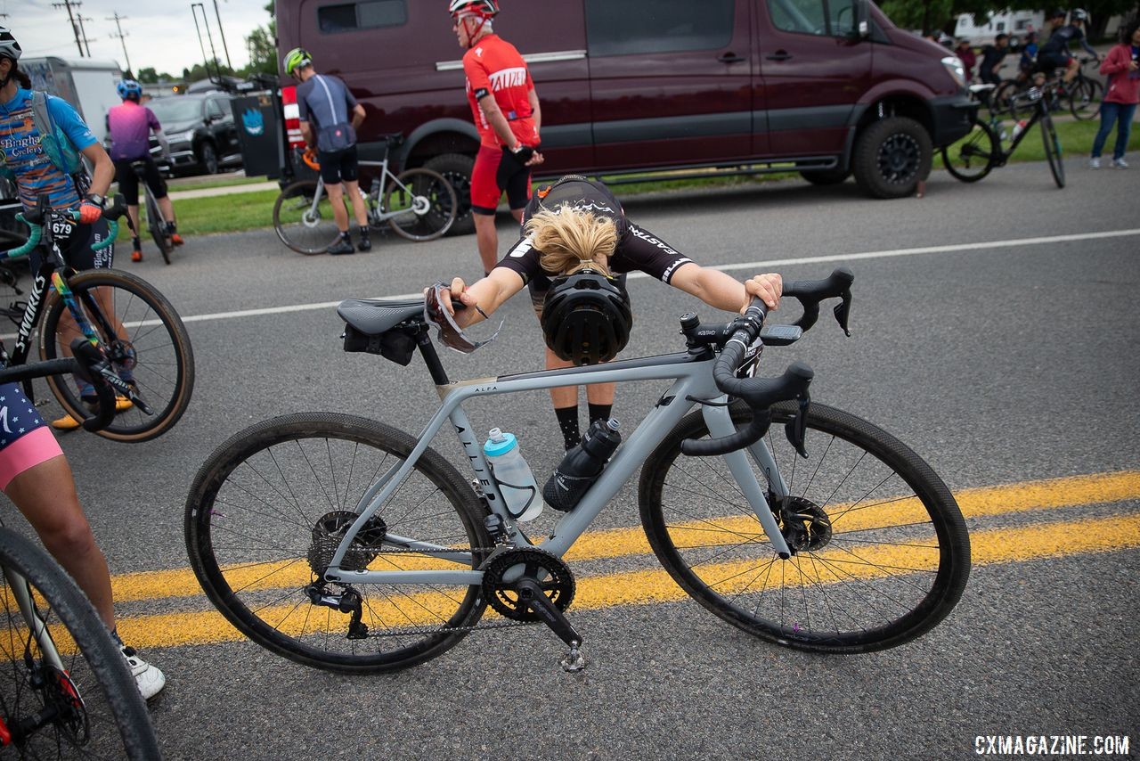 Queen of Kanza, Amity Rockwell takes pre race stretching seriously. 2019 Crusher in the Tushar Gravel Race. © Cathy Fegan-Kim / Cottonsox Photo