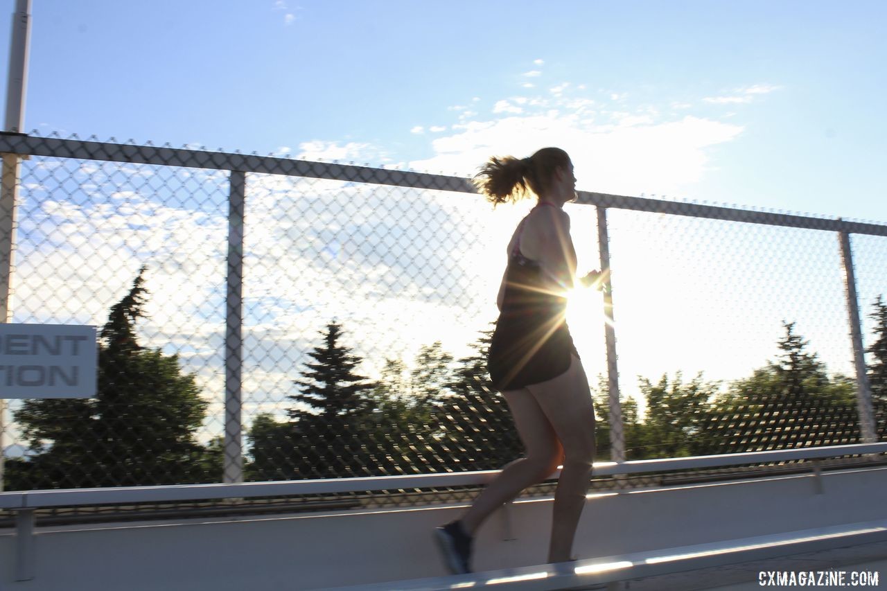 Lauren Zoerner takes in some early morning sun during the stadium stairs. 2019 Women's MontanaCrossCamp, Thursday. © Z. Schuster / Cyclocross Magazine