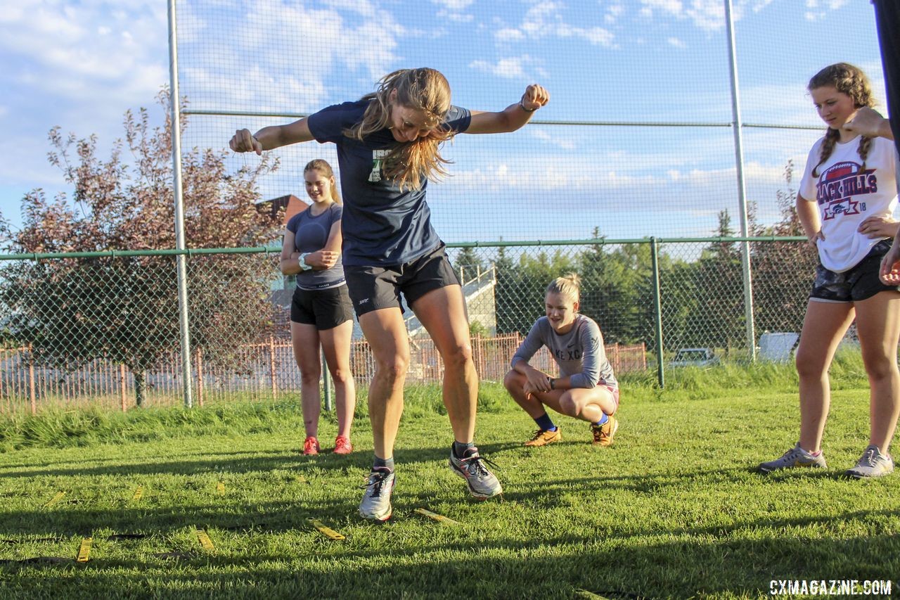 Coach Rebecca Fahringer gets down during the speed ladder drills. 2019 Women's MontanaCrossCamp, Thursday. © Z. Schuster / Cyclocross Magazine