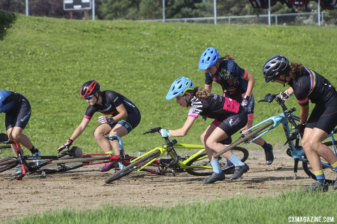 Riders scramble to their feet from the prone position. 2019 Women's MontanaCrossCamp, Wednesday AM. © Z. Schuster / Cyclocross Magazine