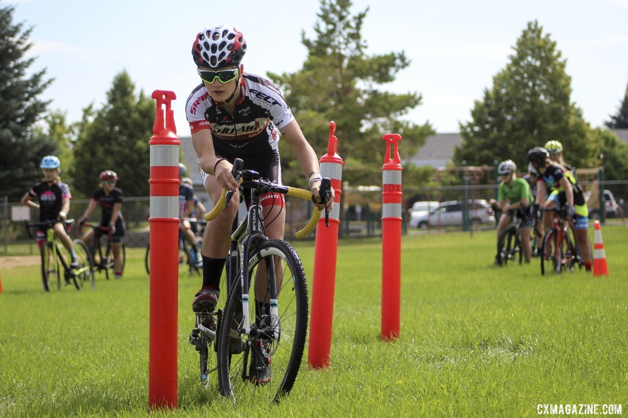 Cassidy Hickey weaves through the obstacle course chicanes. 2019 Women's MontanaCrossCamp, Wednesday AM. © Z. Schuster / Cyclocross Magazine