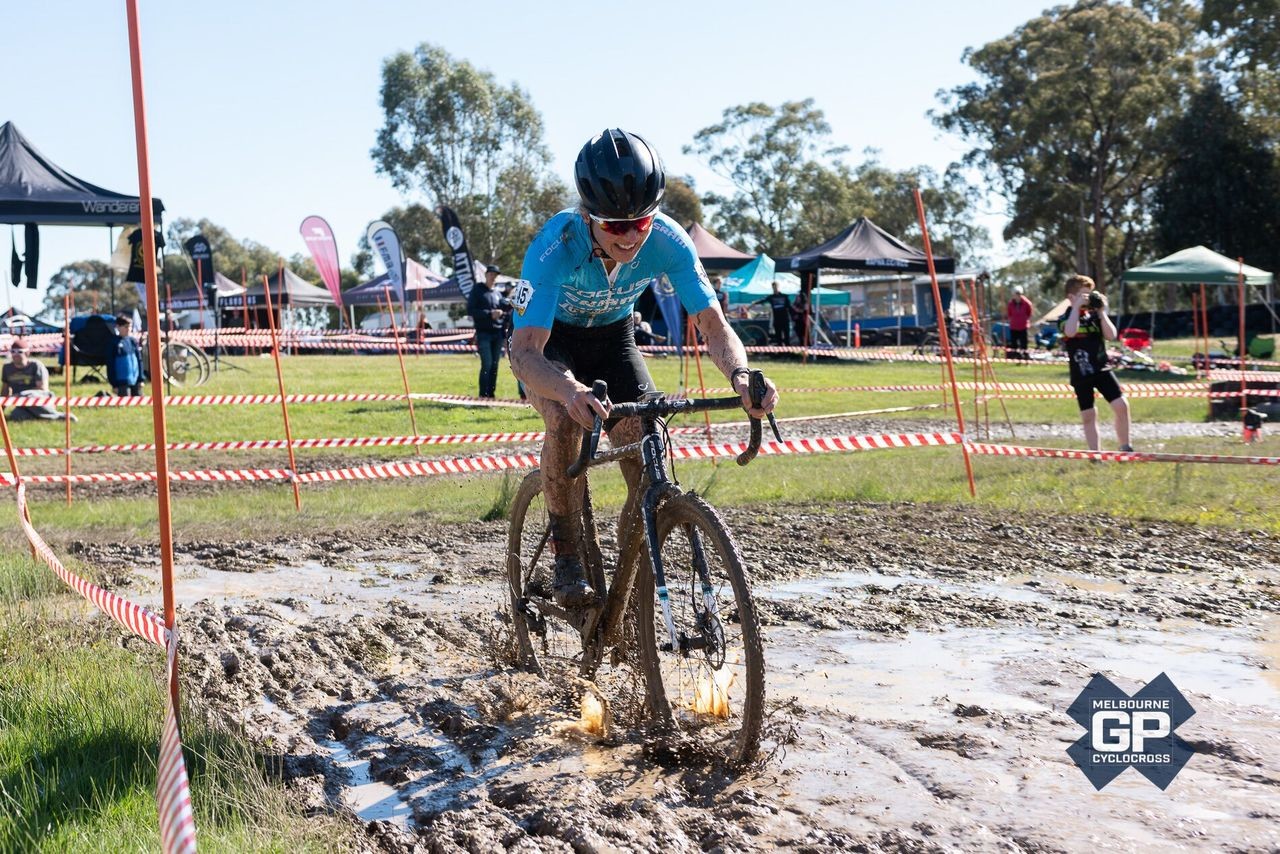 Rebecca Locke rides through one of the muddy sections. 2019 MELGPCX Day 1, Melbourne, Australia. © Ernesto Arriagada