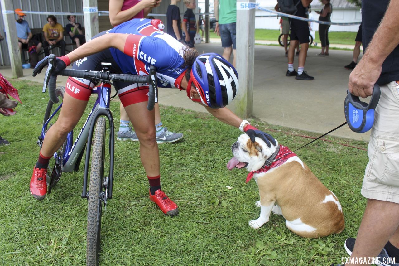 A dog owner herself, Katerina Nash made her way to congratulate this Doggy Cross finisher. 2019 Doggy Cross, Jingle Cross World Cup. © Z. Schuster / Cyclocross Magazine