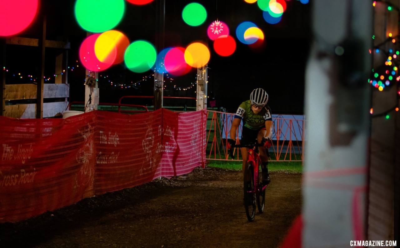 A rider navigates through three layers of bokeh. 2019 Jingle Cross. © A. Yee / Cyclocross Magazine