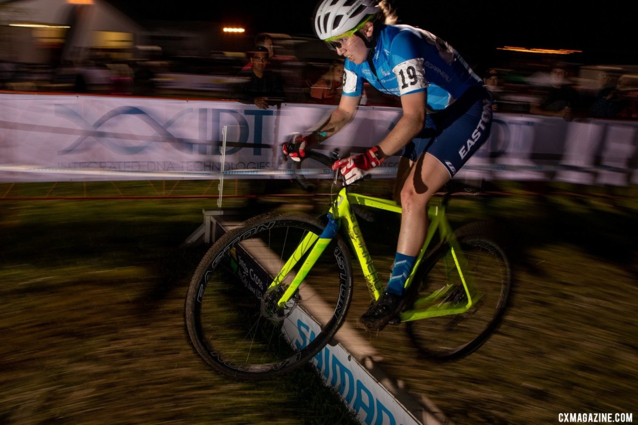 Bridget Tooley had no touble hopping the barriers in the dark. 2019 Jingle Cross. © A. Yee / Cyclocross Magazine