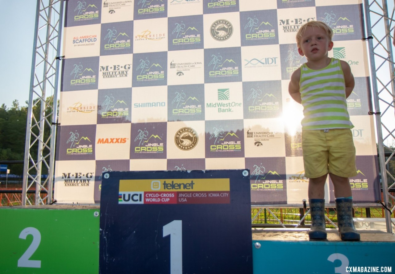 A young volunteer awaits the pro men podium on Sunday. 2019 Jingle Cross. © A. Yee / Cyclocross Magazine