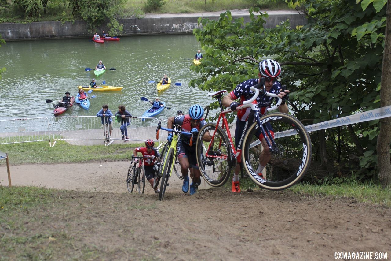 Stephen Hyde charges up "The Wall" as kayakers watch behind. 2019 Rochester Cyclocross Day 2. © Z. Schuster / Cyclocross Magazine