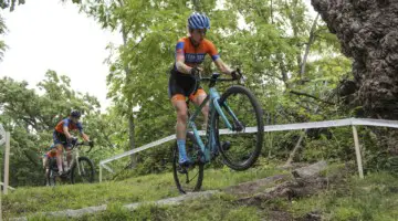 Clara Honsinger sends it over the granite block into a descent. 2019 Rochester Cyclocross Friday Pre-Ride. © Z. Schuster / Cyclocross Magazine