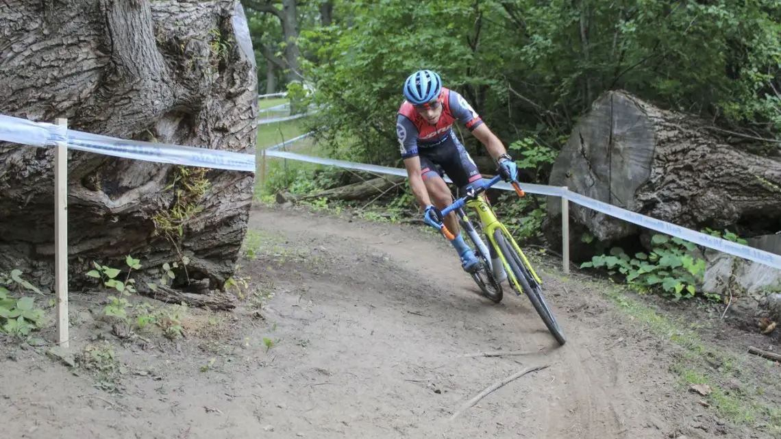 Kerry Werner passes through the entrance to Double Trouble, which was formed by cutting a downed willow tree. 2019 Rochester Cyclocross Day 2, Sunday. © Z. Schuster / Cyclocross Magazine