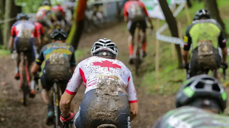 Michael van den Ham fights through early race traffic. 2019 World Cup Waterloo, Elite Men. © D. Mable / Cyclocross Magazine