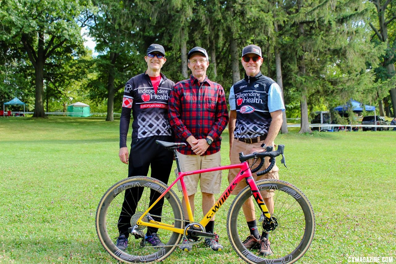 These three kindly lent a helpping hand in holding the bike. Maghalie Rochette's Rochester Cyclocross-winning S-Works Crux. © Z. Schuster / Cyclocross Magazine