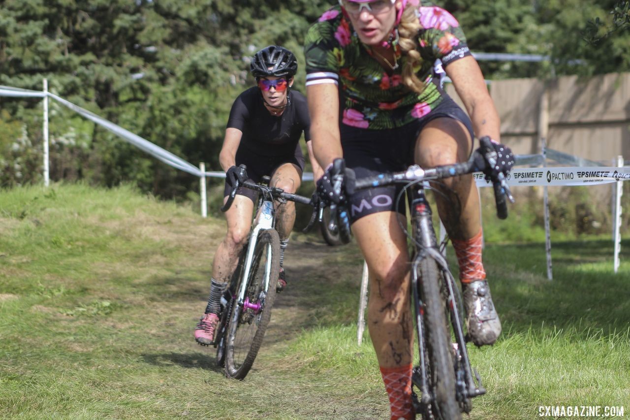 Lauren Harkness marks Sydney Guagliardo's wheel early on in the Elite Women's race. 2019 CCC Hopkins Park CX at Indian Lakes. © Z. Schuster / Cyclocross Magazine