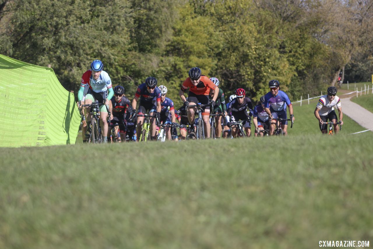 Rory Jack and Josh Fitzgerald lead the field out up the uphill holeshot. 2019 Sunrise Park Cyclocross, Chicago Cross Cup. © Z. Schuster / Cyclocross Magazine