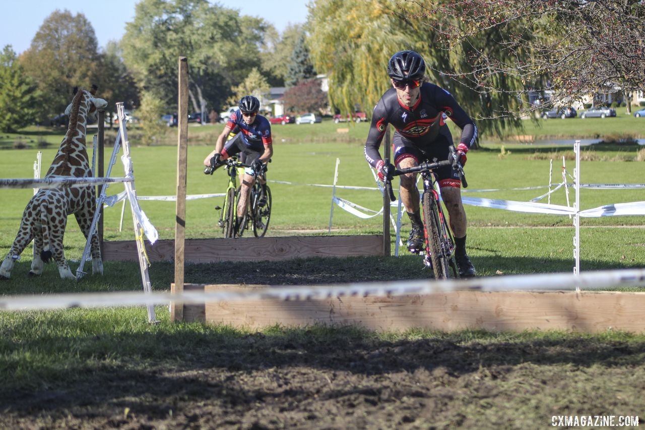 Jeremy Bloyd-Peshkin hops through the barriers in Lap 1. 2019 Sunrise Park Cyclocross, Chicago Cross Cup. © Z. Schuster / Cyclocross Magazine