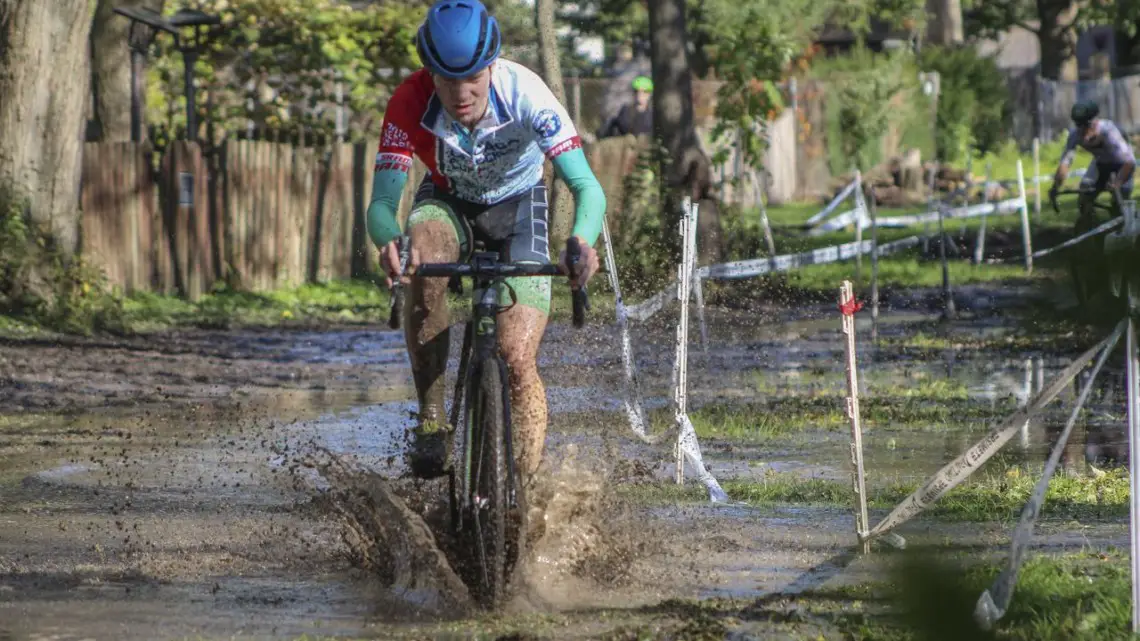 Rory Jack splashes through the lake with a small lead on Tim Strelecki. 2019 Sunrise Park Cyclocross, Chicago Cross Cup. © Z. Schuster / Cyclocross Magazine