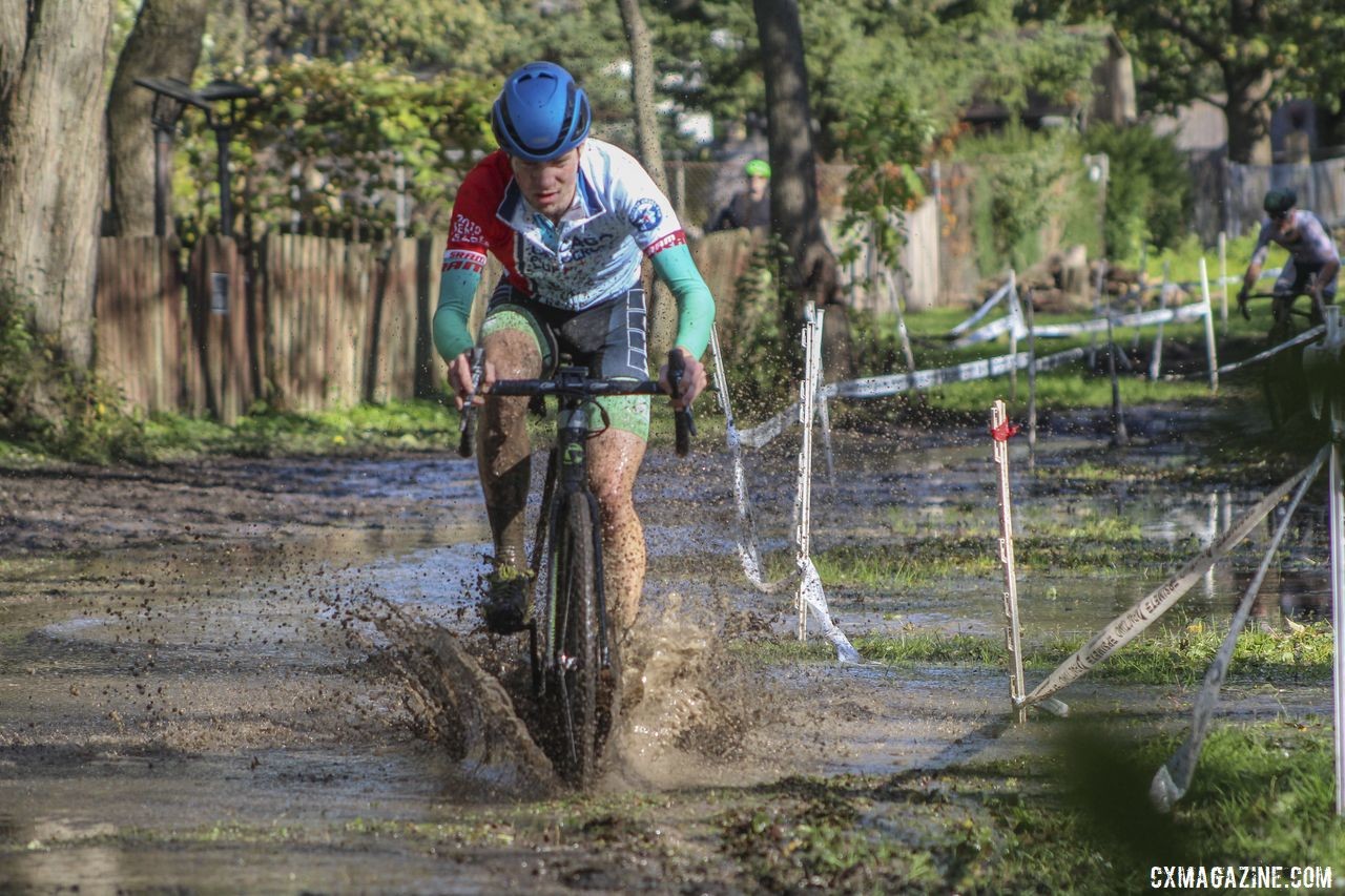 Rory Jack splashes through the lake with a small lead on Tim Strelecki. 2019 Sunrise Park Cyclocross, Chicago Cross Cup. © Z. Schuster / Cyclocross Magazine