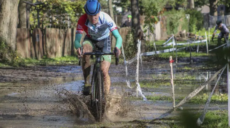 Rory Jack splashes through the lake with a small lead on Tim Strelecki. 2019 Sunrise Park Cyclocross, Chicago Cross Cup. © Z. Schuster / Cyclocross Magazine