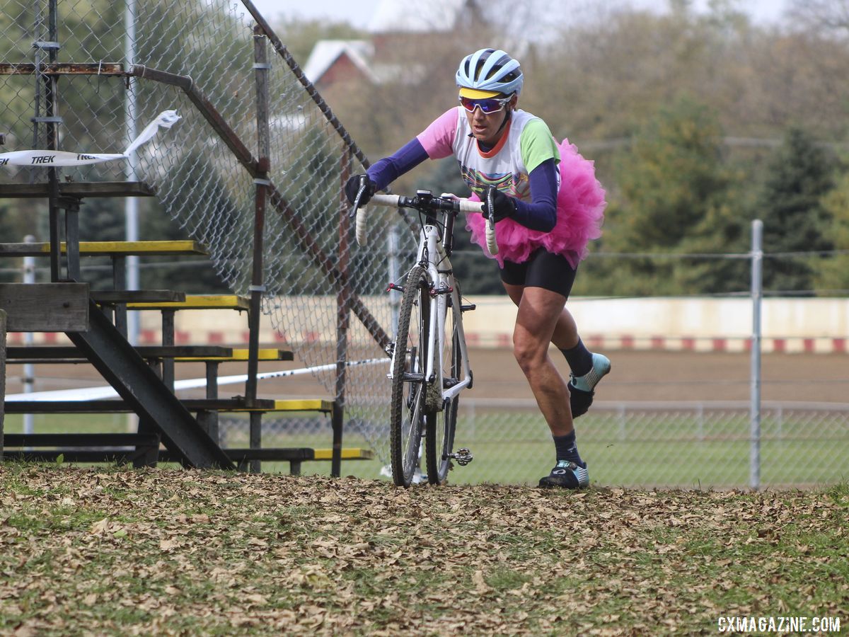Anne Mayer gets set to remount her bike after the stairs. 2019 Cross Fire Halloween Race, Wisconsin. © Z. Schuster / Cyclocross Magazine