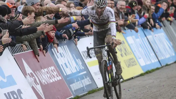 Mathieu van der Poel celebrates with fans after winning his first race of the 2019/20 season. 2019 Superprestige Ruddervoorde. © B. Hazen / Cyclocross Magazine