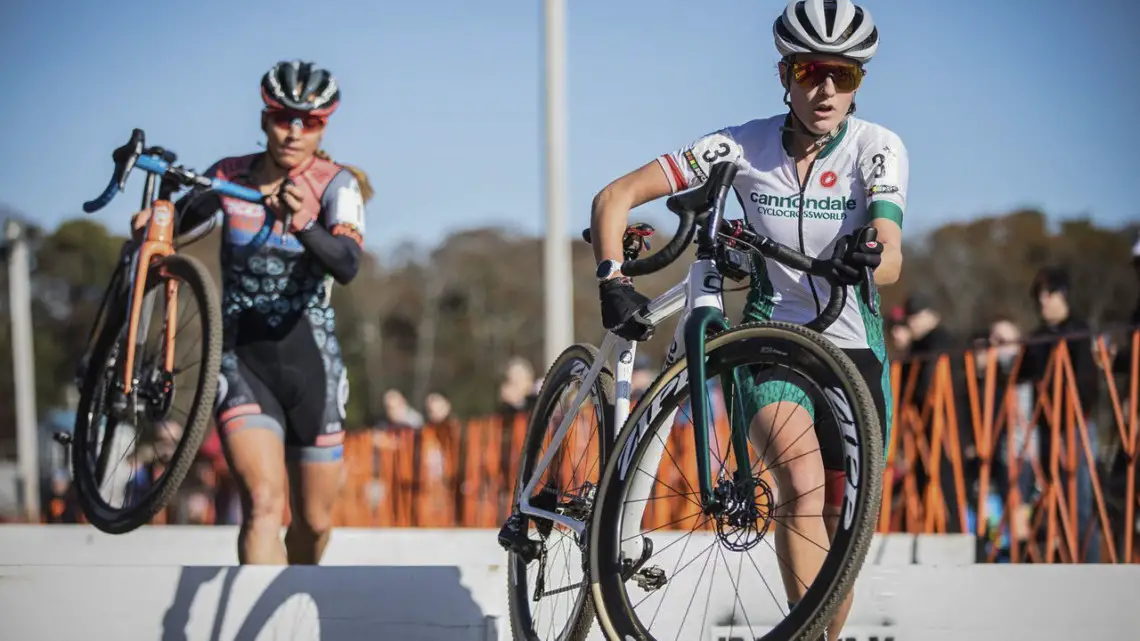 Katie Clouse and Rebecca Fahringer hit the barriers together. 2019 Really Rad Festival of Cyclocross Day 1. © Angelica Dixon