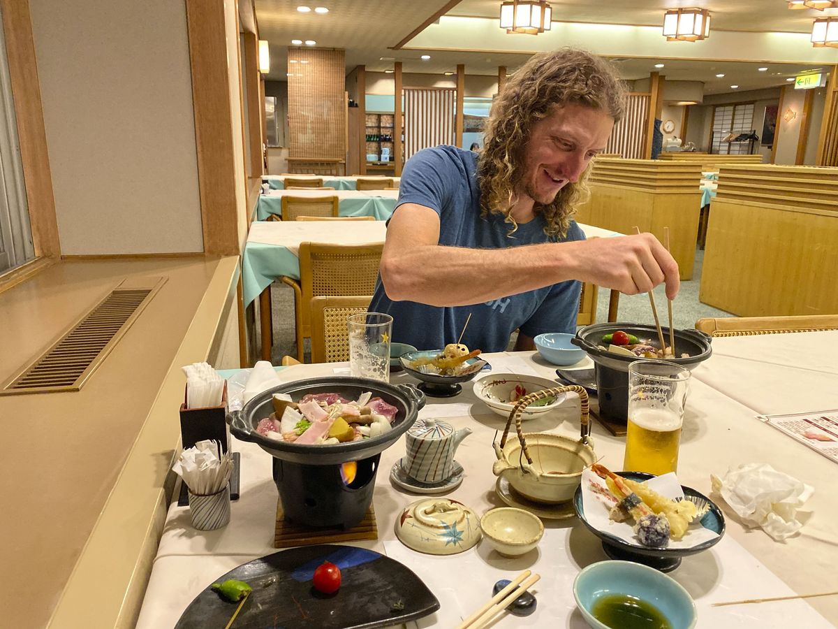 Barry Wicks dines with Carl Decker at the nearly abandoned resort hotel.