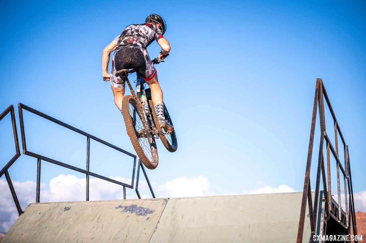 A rider sends in one of the two flyovers during his qualifying heat. 2019 Singlespeed Cyclocross World Championships, Utah. © Jeff Vander Stucken