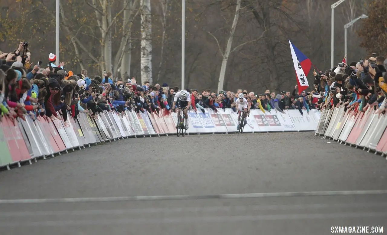 Mathieu van der Poel and Eli Iserbyt head down the finishing straight. 2019 World Cup Tabor, Czech Republic. © B. Hazen / Cyclocross Magazine