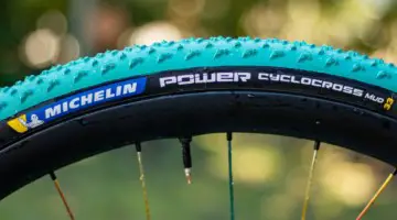 The latest Michelin Power Cyclocross Mud tubeless clincher tire kept its predecssor's width. While the old one was called 30mm, and the new one is listed at 33mm, both inflate over 35mm on a 23mm internal width rim. © Cyclocross Magazine