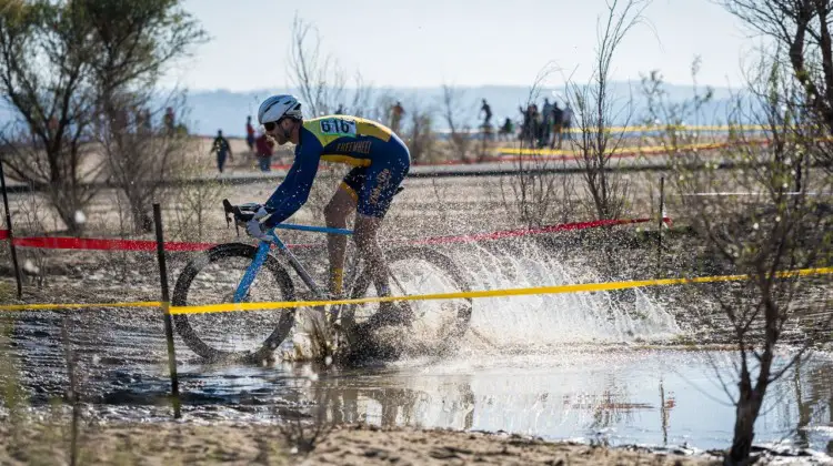 Puddle crossings, mud and heavy sand made for a heavy track. 2019 Sacramento CX Granite Beach, California. © Jeff Vander Stucken