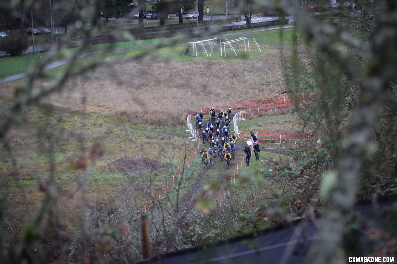 The Collegiate mens varsity race heads for the first climb shortly after the start. Collegiate Varsity Men. 2019 Cyclocross National Championships, Lakewood, WA. © D. Mable / Cyclocross Magazine