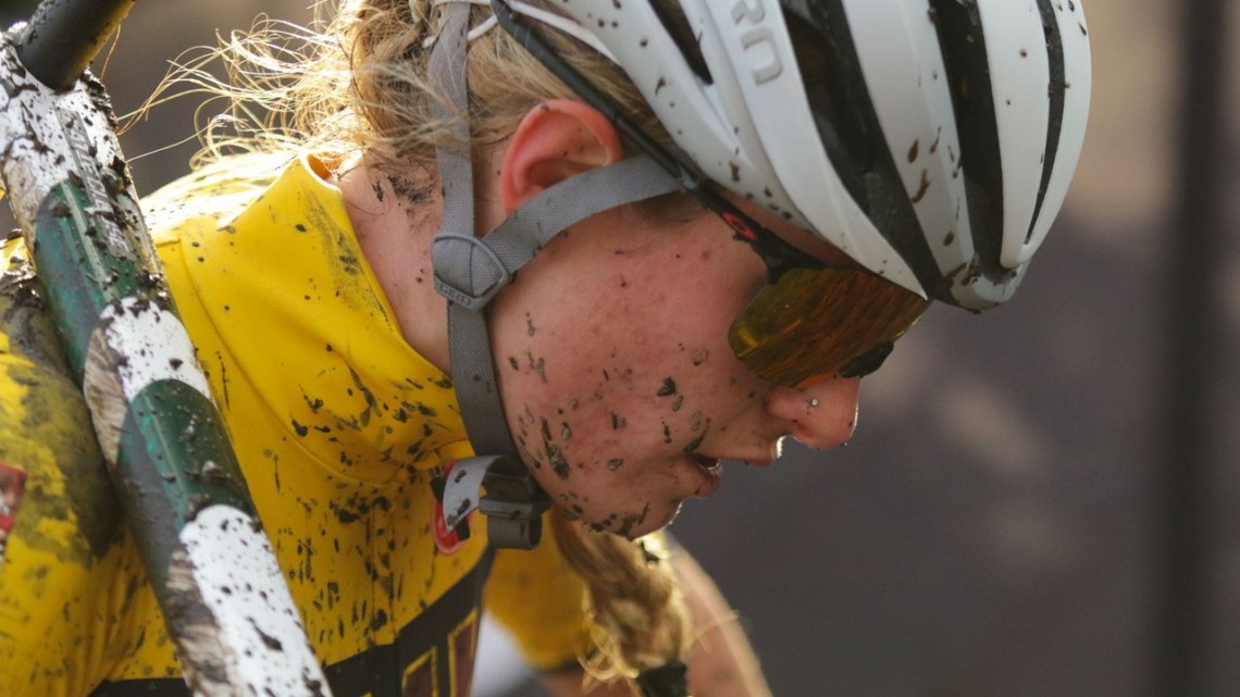 Katie Clouse wears a full mask of pain as she runs the final steep climb. Collegiate Varsity Women. 2019 Cyclocross National Championships, Lakewood, WA. © D. Mable / Cyclocross Magazine