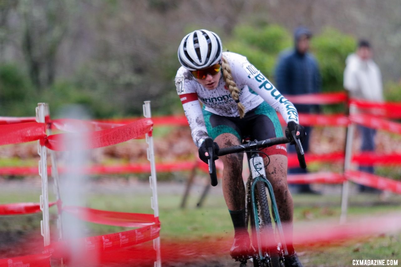 Katie Clouse leans into a corner in a sea of course tape. U23 Women. 2019 Cyclocross National Championships, Lakewood, WA. © D. Mable / Cyclocross Magazine