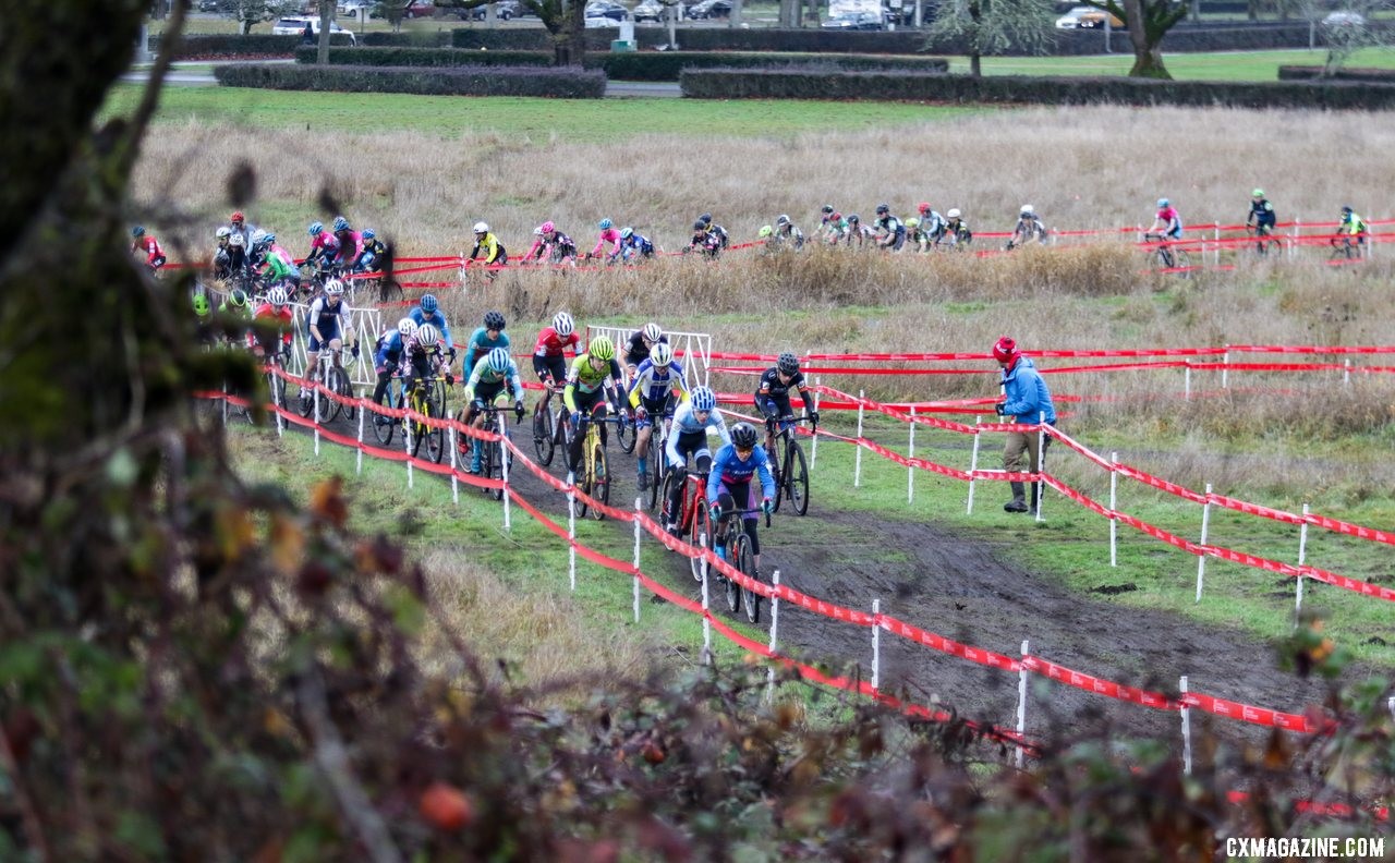 Benjamin Crismon leads a large group of riders to the base of the first climb. Junior Men 15-16. 2019 Cyclocross National Championships, Lakewood, WA. © D. Mable / Cyclocross Magazine