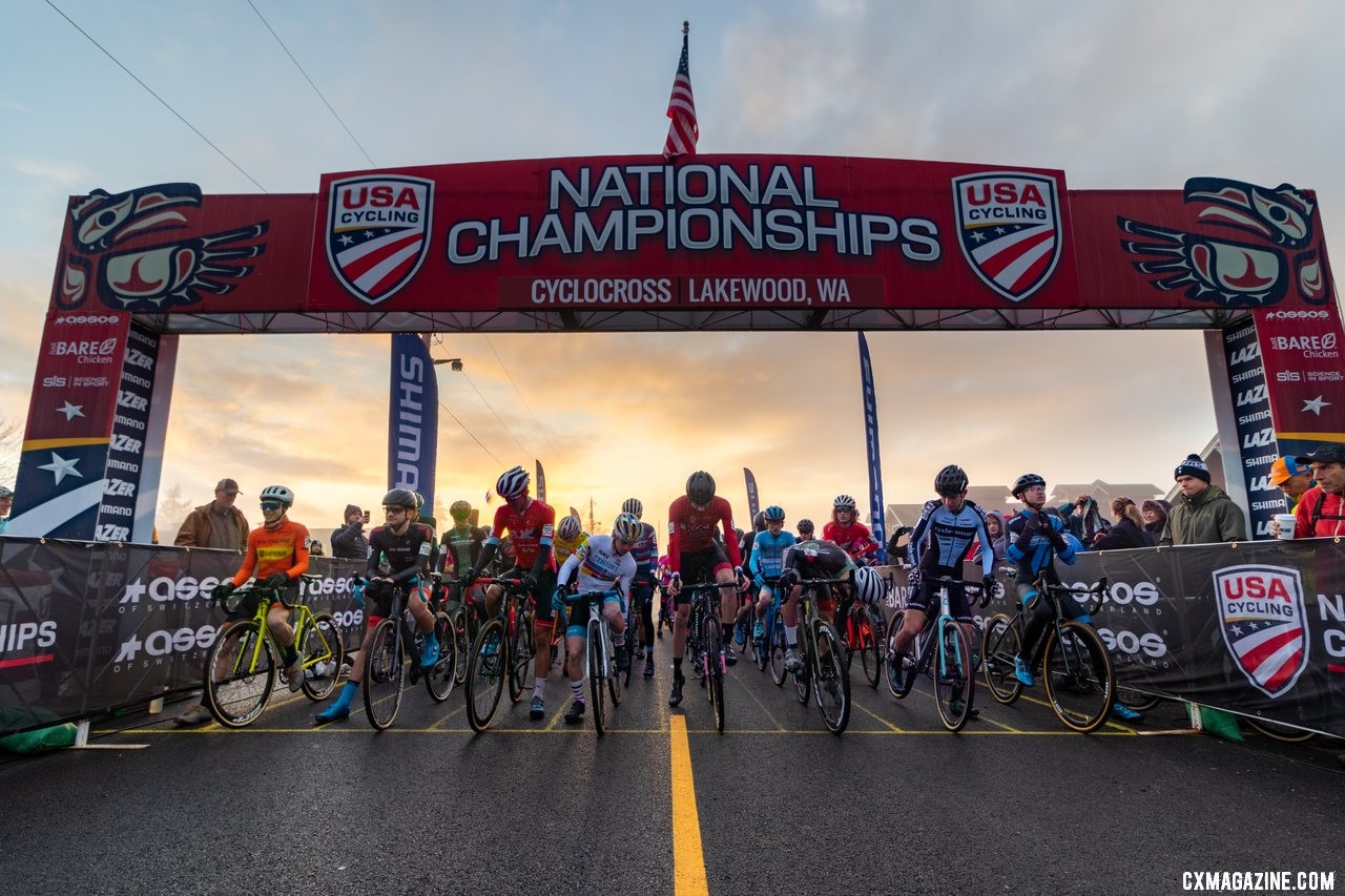 The Junior Men get set to race as the sun rises in Lakewood. Junior 17-18 Men. 2019 Cyclocross National Championships, Lakewood, WA. © A. Yee / Cyclocross Magazine