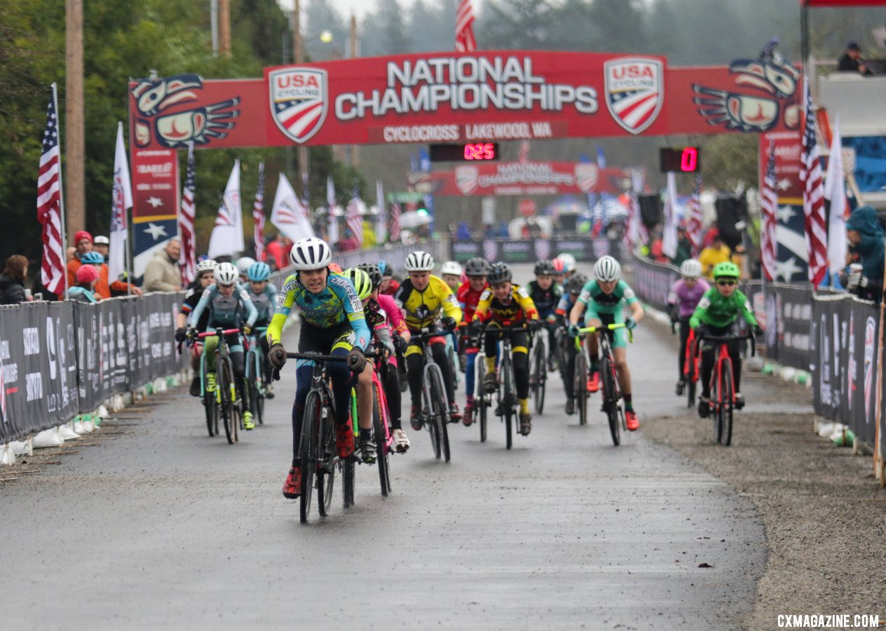 Rowan Child takes the holeshot, leading a field of 30 riders onto the muddy course. Junior Men 11-12. 2019 Cyclocross National Championships, Lakewood, WA. © D. Mable / Cyclocross Magazine