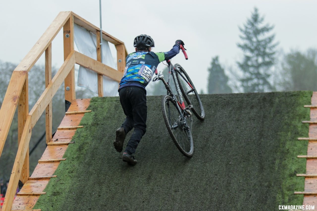 Rafe Carlson resorts to pushing up a steep flyover. Junior Men 13-14. 2019 Cyclocross National Championships, Lakewood, WA. © D. Mable / Cyclocross Magazine
