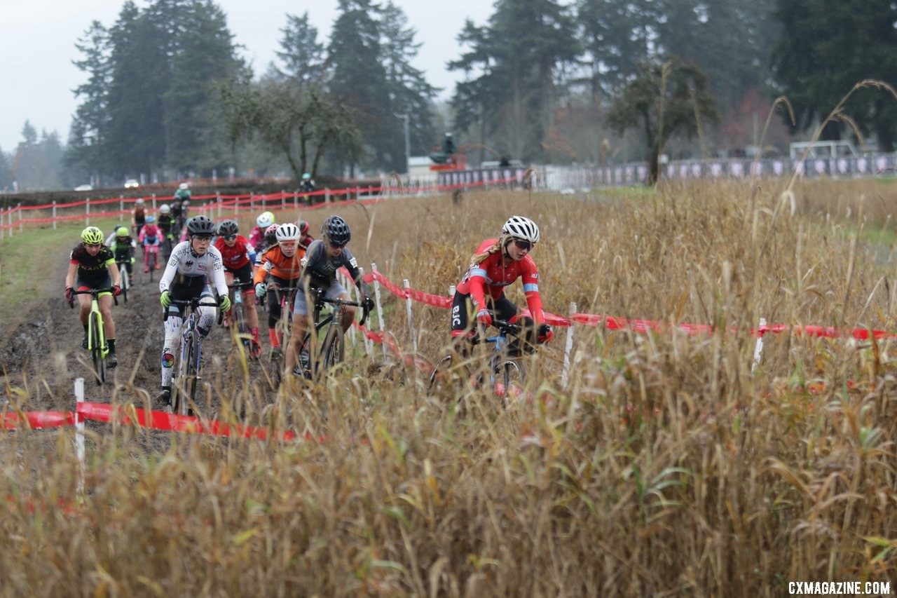 Jorja Bond takes the holeshot and leads the field of 24 riders to the base of the first climb. Junior Women 13-14. 2019 Cyclocross National Championships, Lakewood, WA. © D. Mable / Cyclocross Magazine