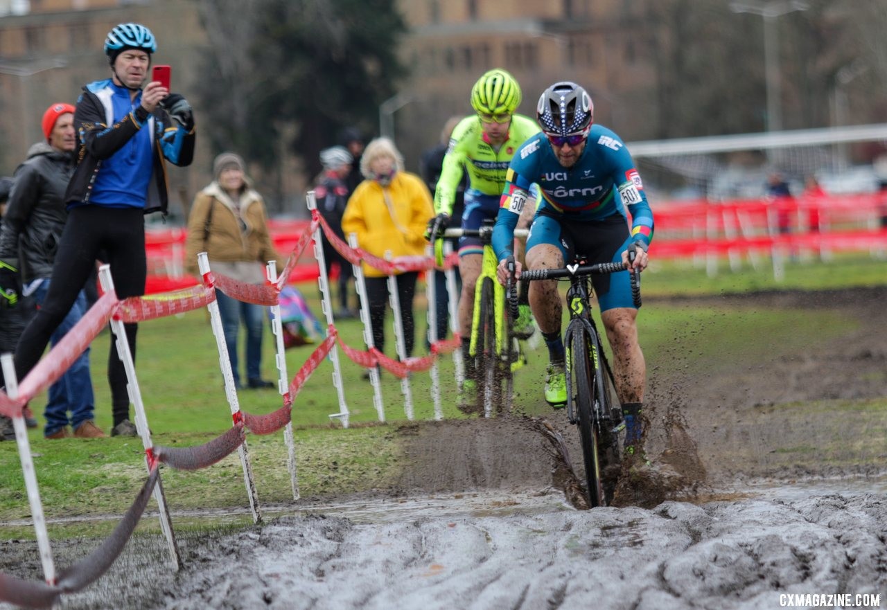 Jake Wells parts a sea of mud while leading Molly Cameron on the first lap. Masters Men 40-44. 2019 Cyclocross National Championships, Lakewood, WA. © D. Mable / Cyclocross Magazine